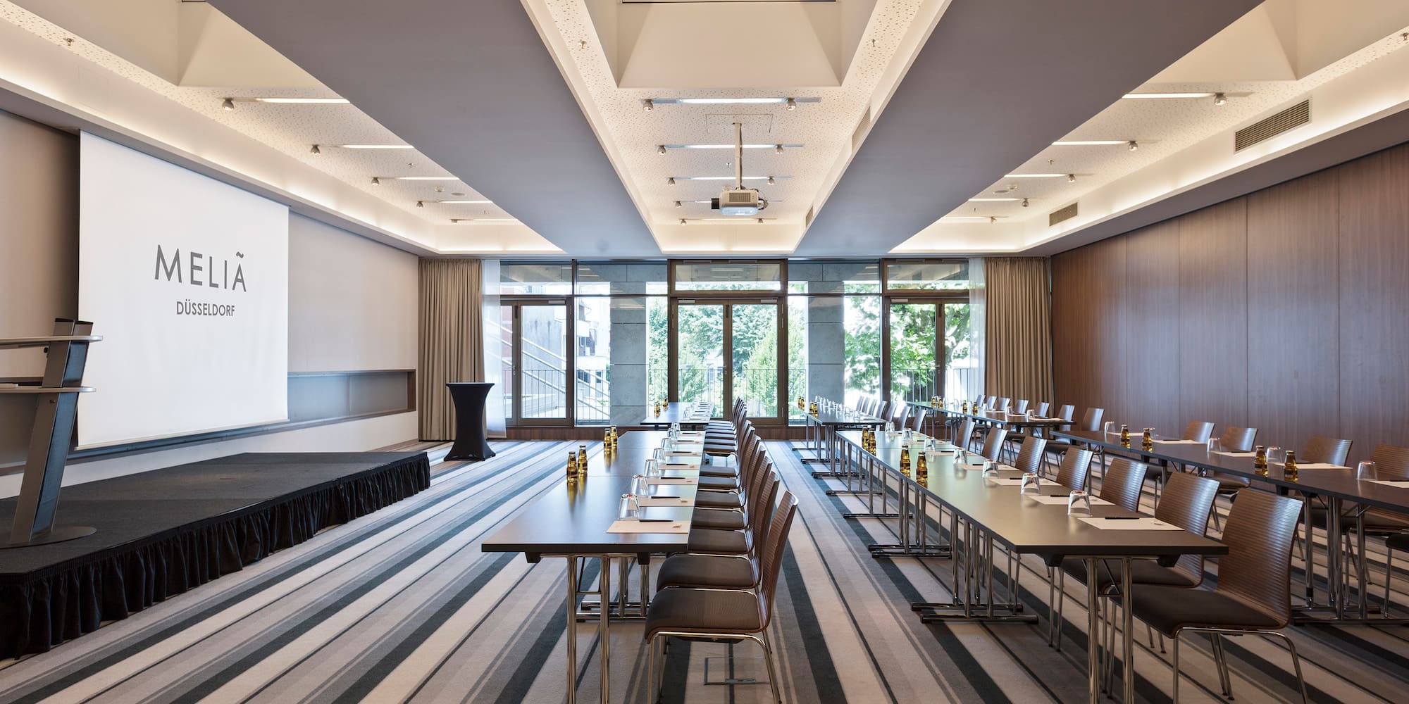 a room with tables and chairs