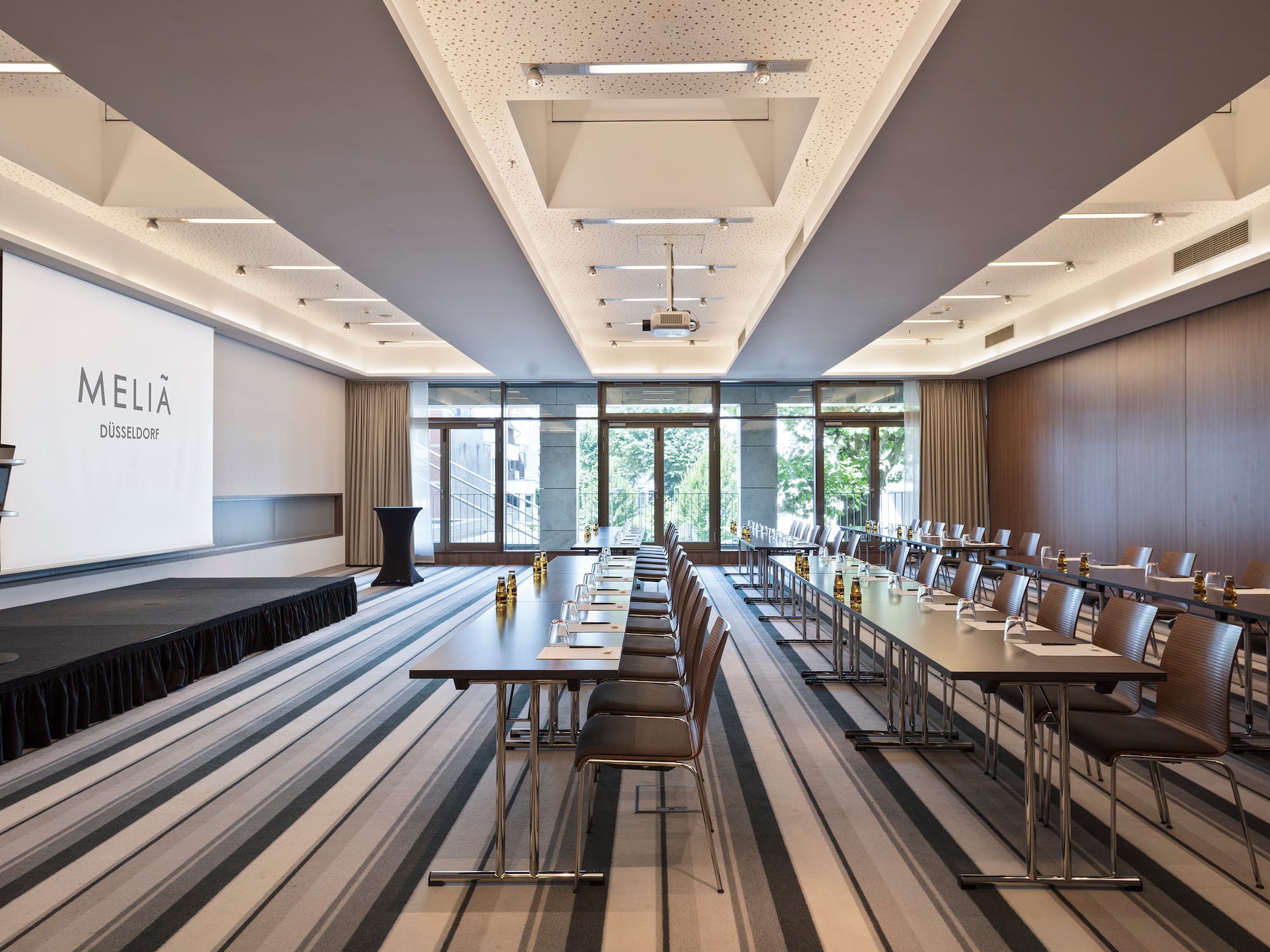 a room with tables and chairs