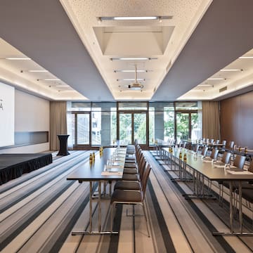 a room with tables and chairs