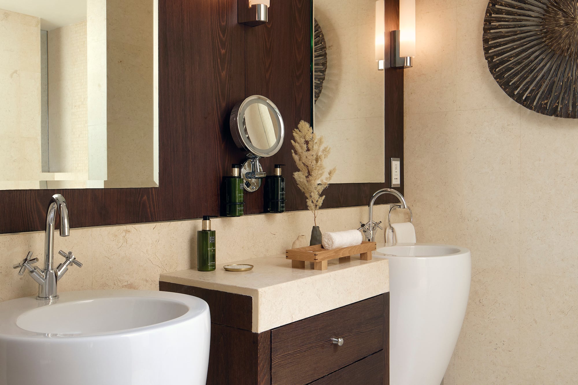 a bathroom with a sink and mirror
