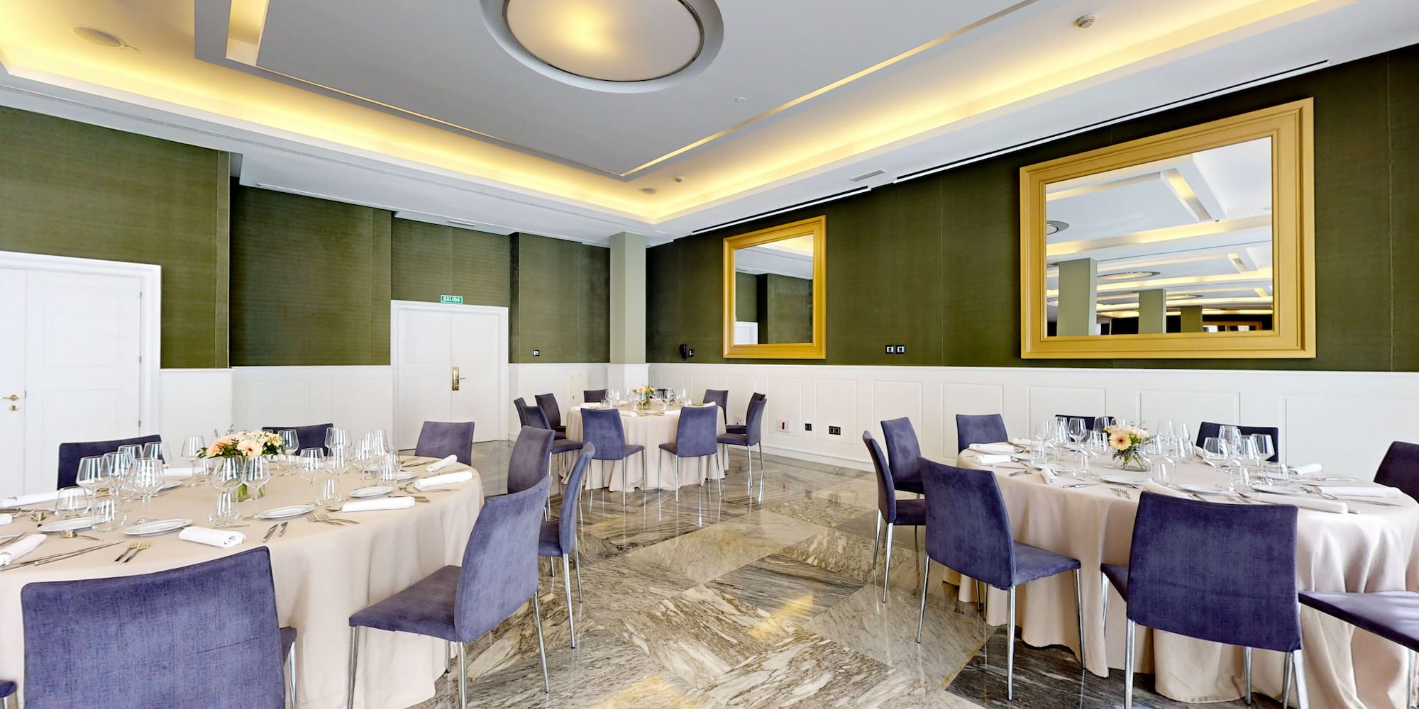 a room with tables and chairs