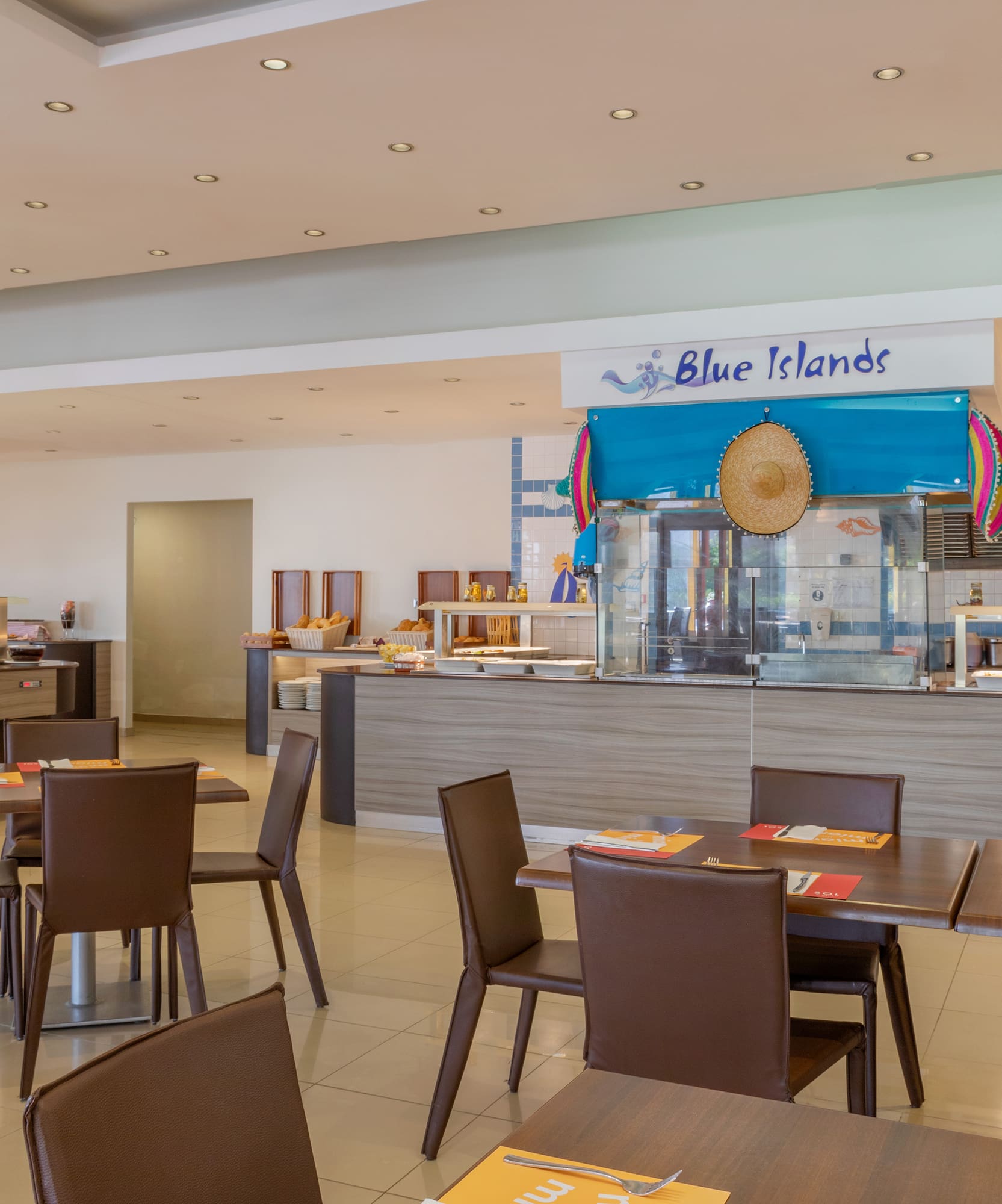 a restaurant with tables and chairs