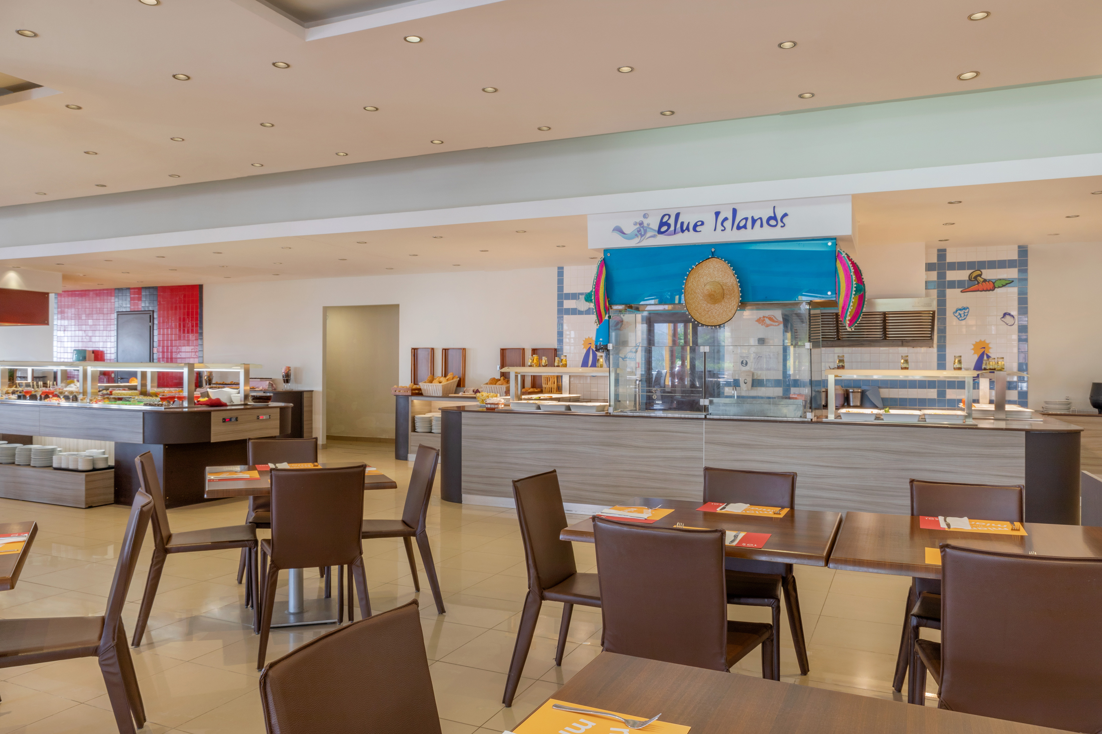 a restaurant with tables and chairs