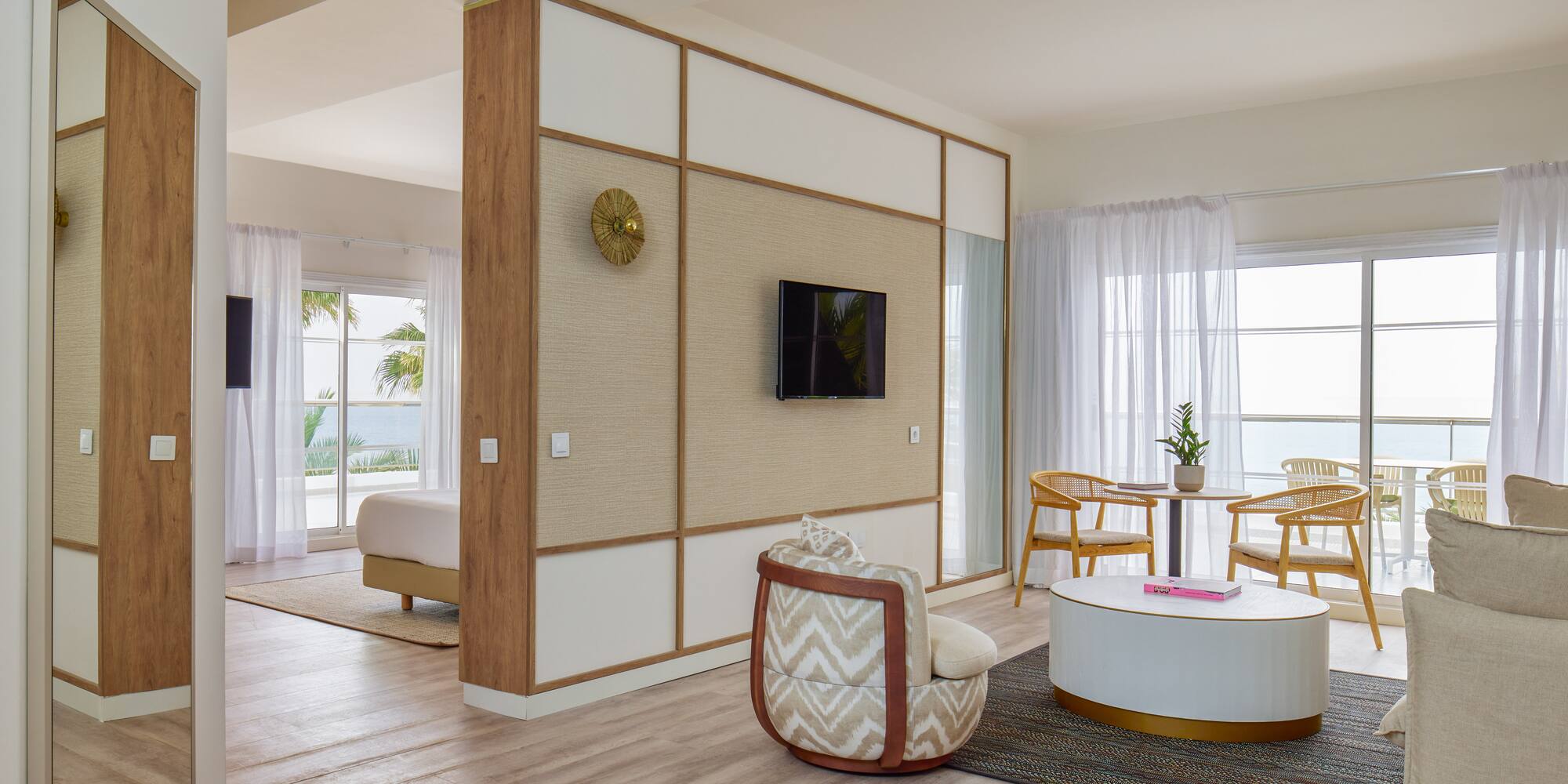 a room with a television and a table