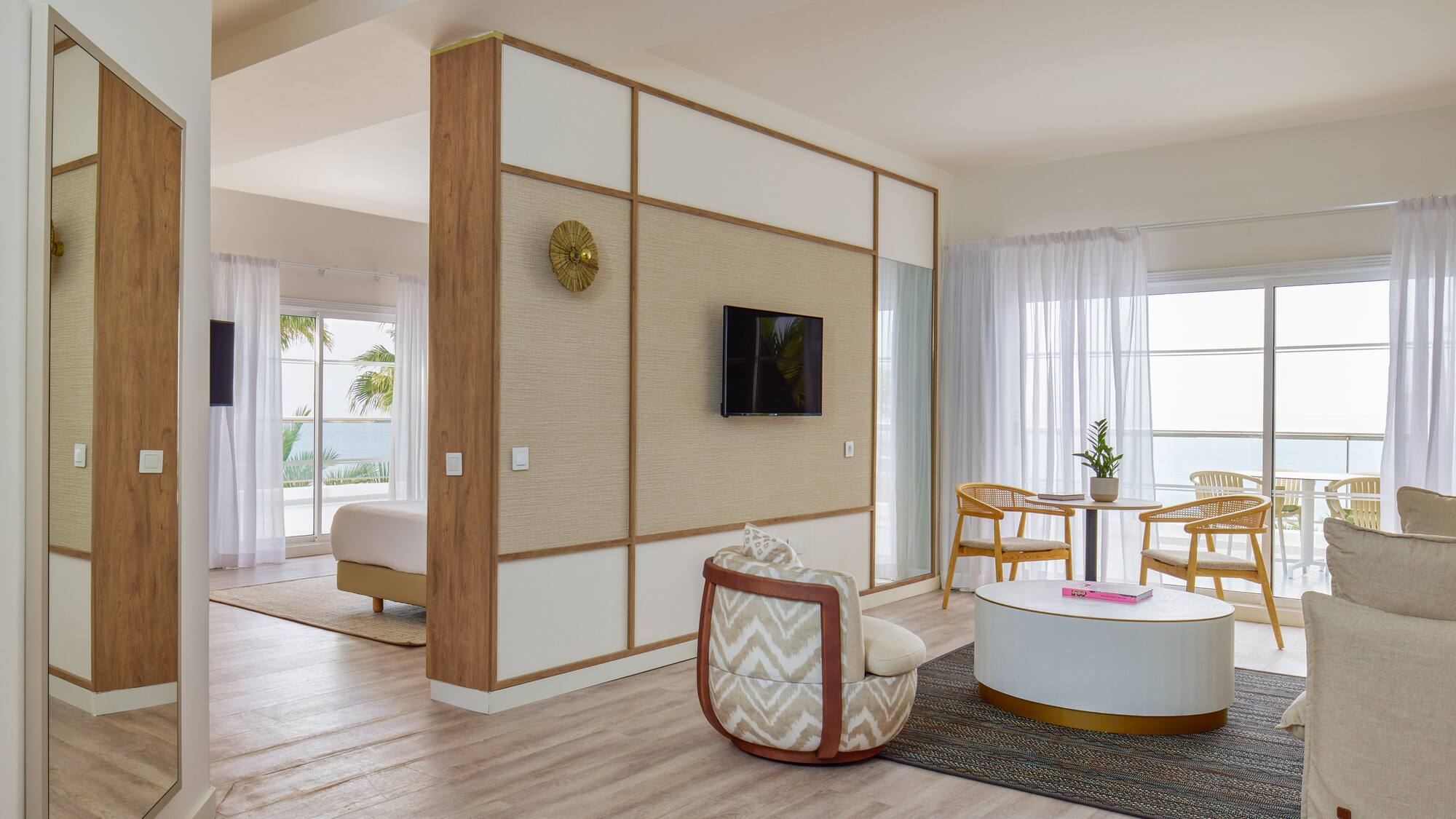 a room with a television and a table