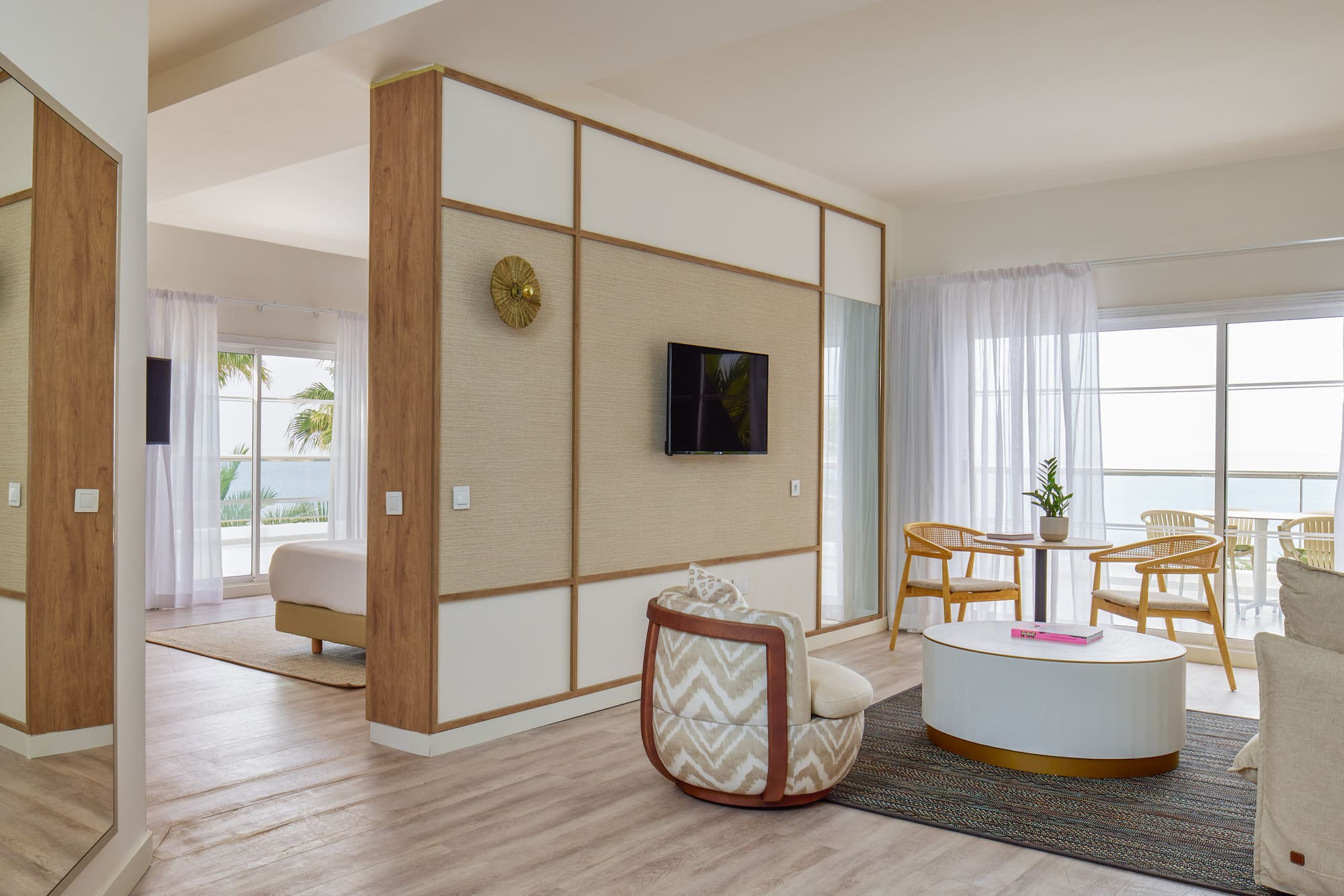 a room with a television and a table