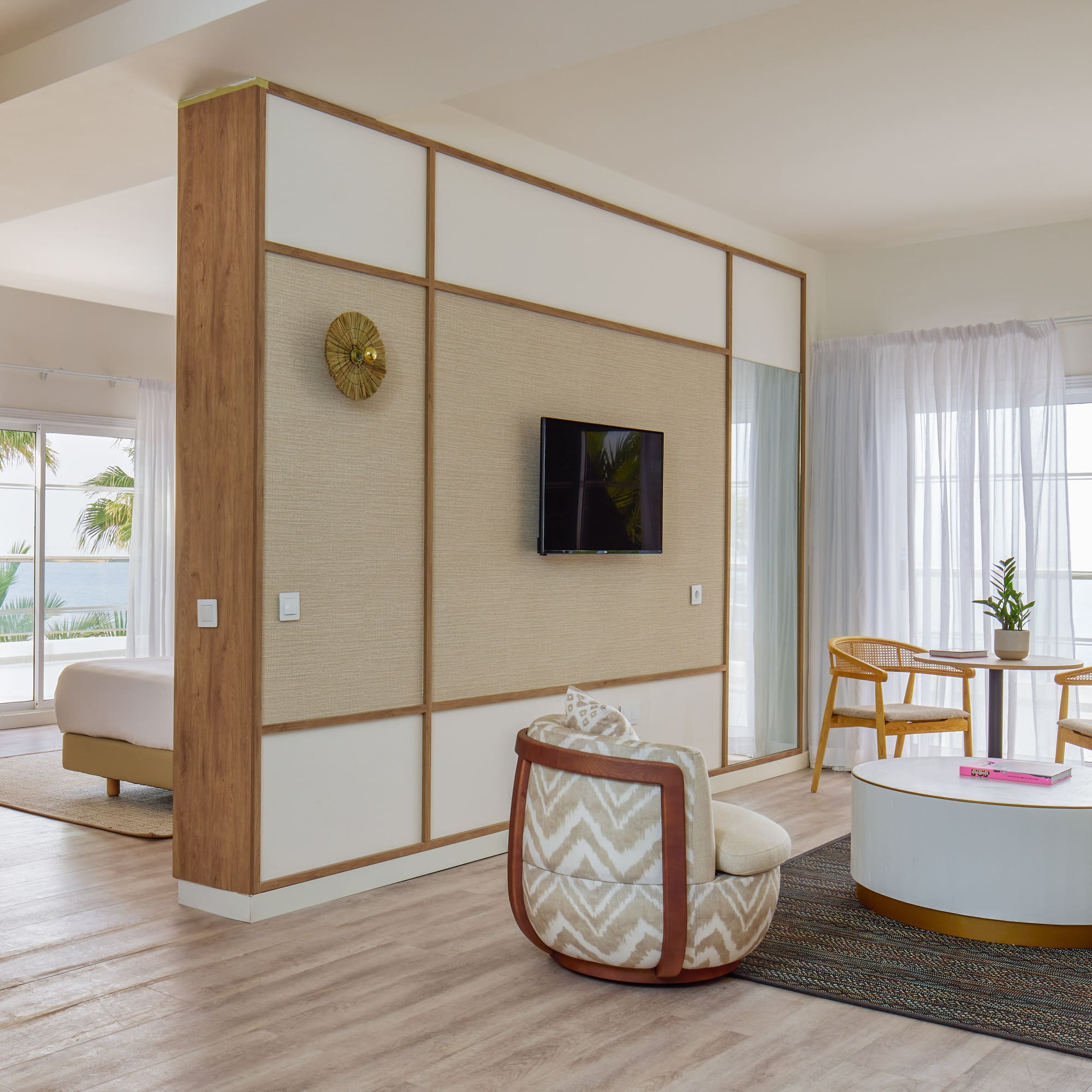 a room with a television and a table