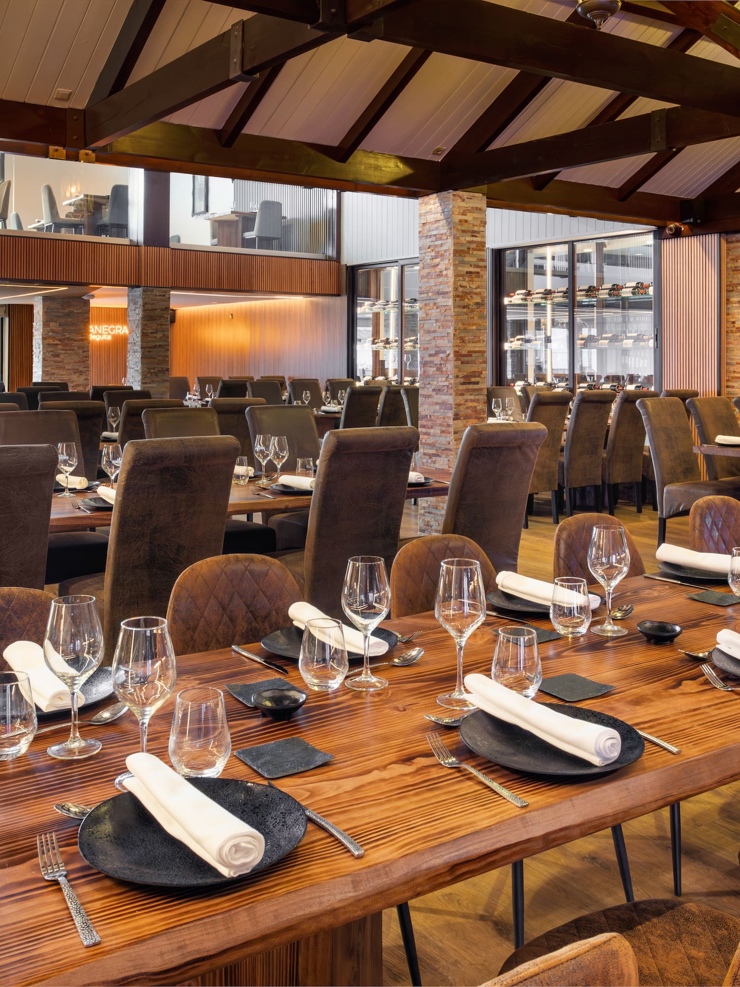 a large room with a large table set for a dinner