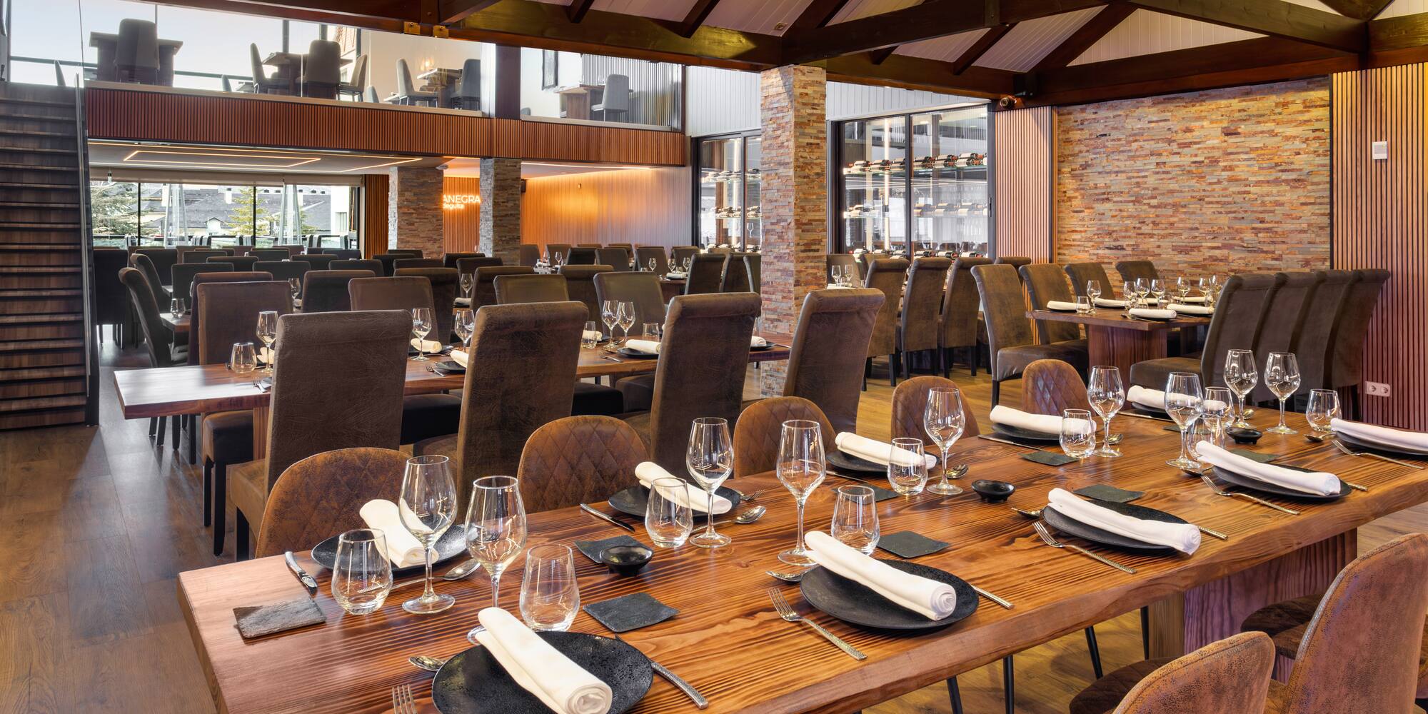 a large room with a large table set for a dinner