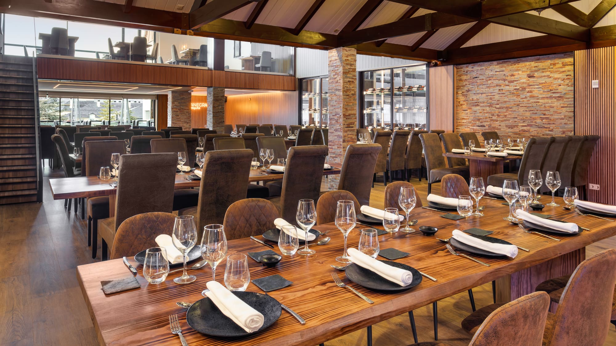 a large room with a large table set for a dinner