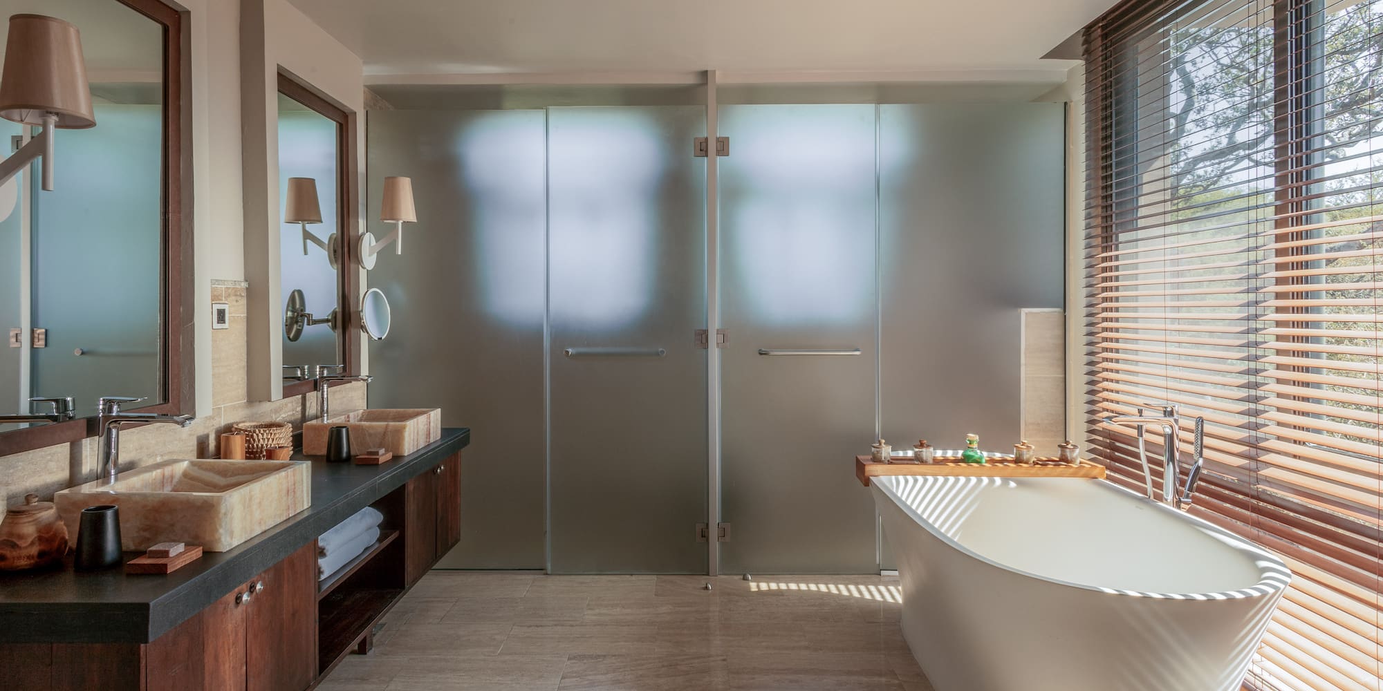 a bathroom with a tub and sink