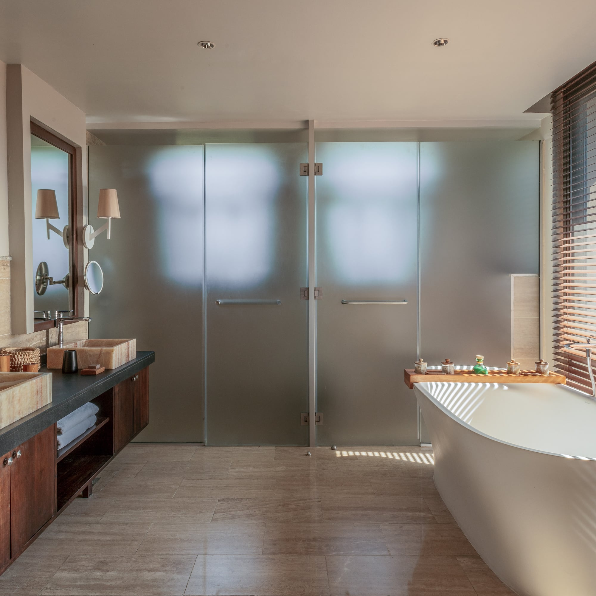 a bathroom with a tub and sink