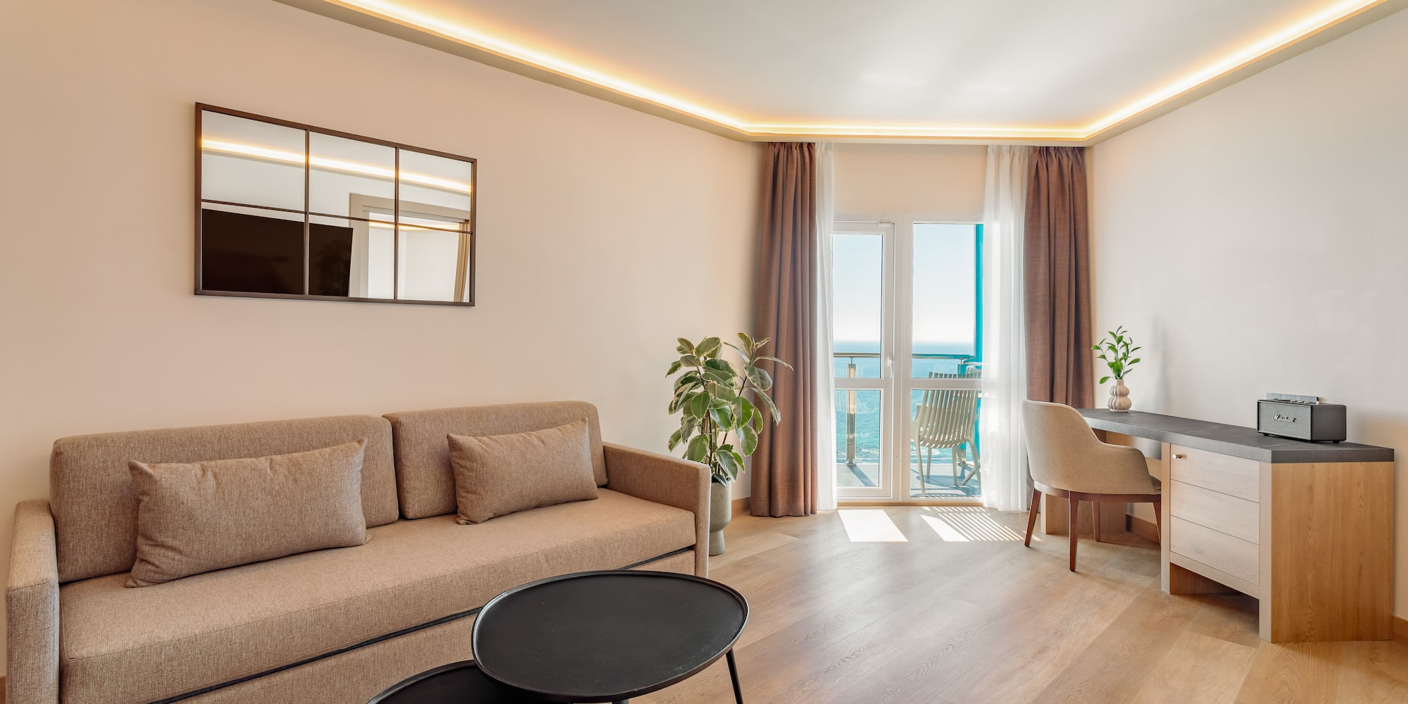 a living room with a couch and table