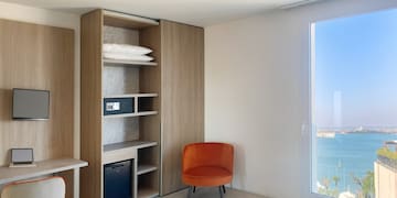 a room with a chair and a door