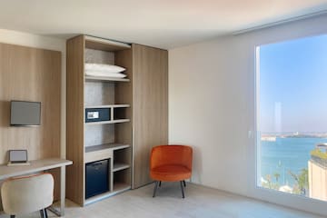 a room with a chair and a door