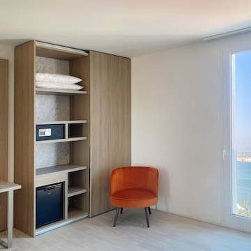 a room with a chair and a door