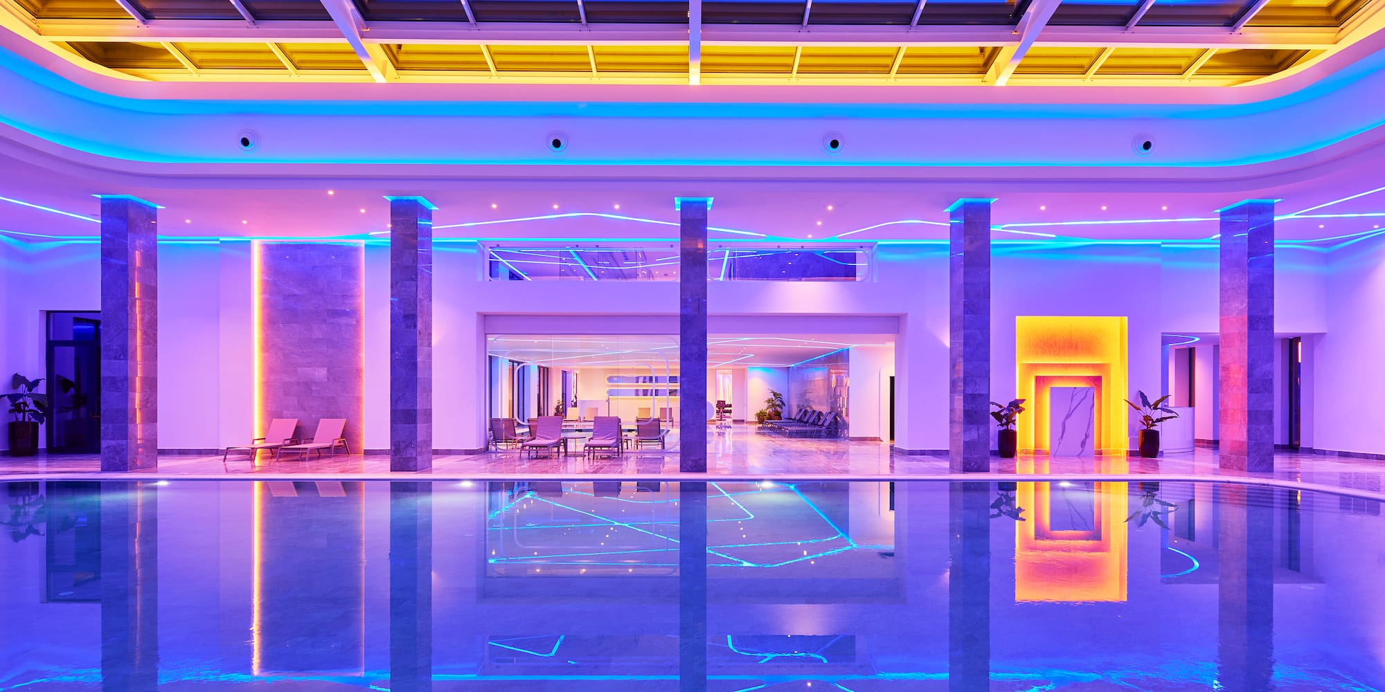 a pool with colorful lights