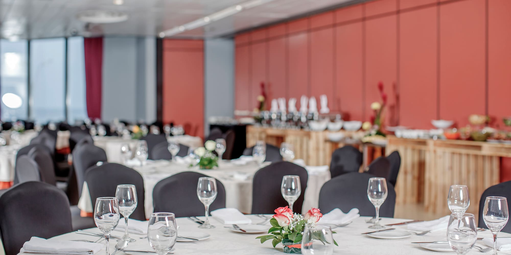 a room with tables and chairs