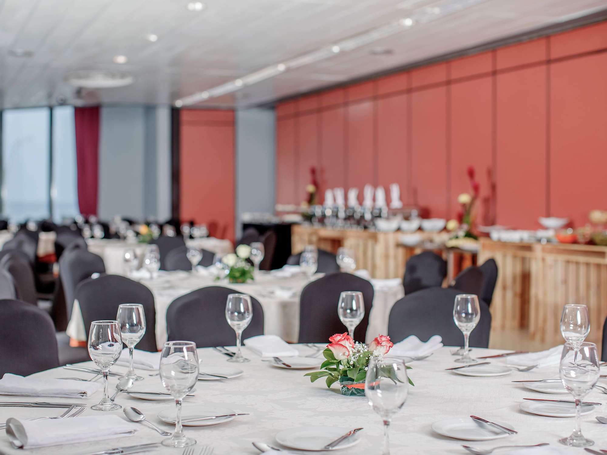 a room with tables and chairs