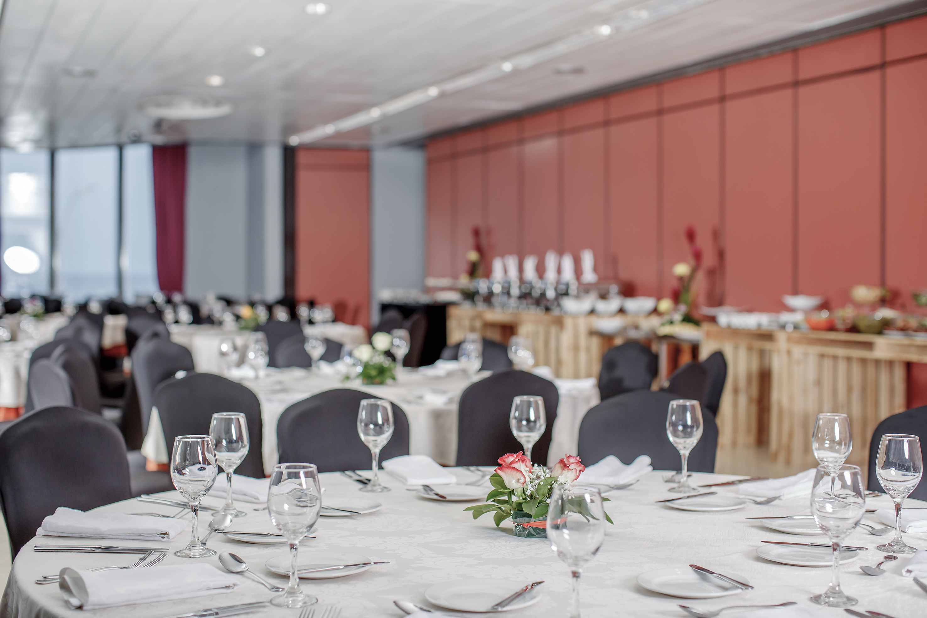 a room with tables and chairs