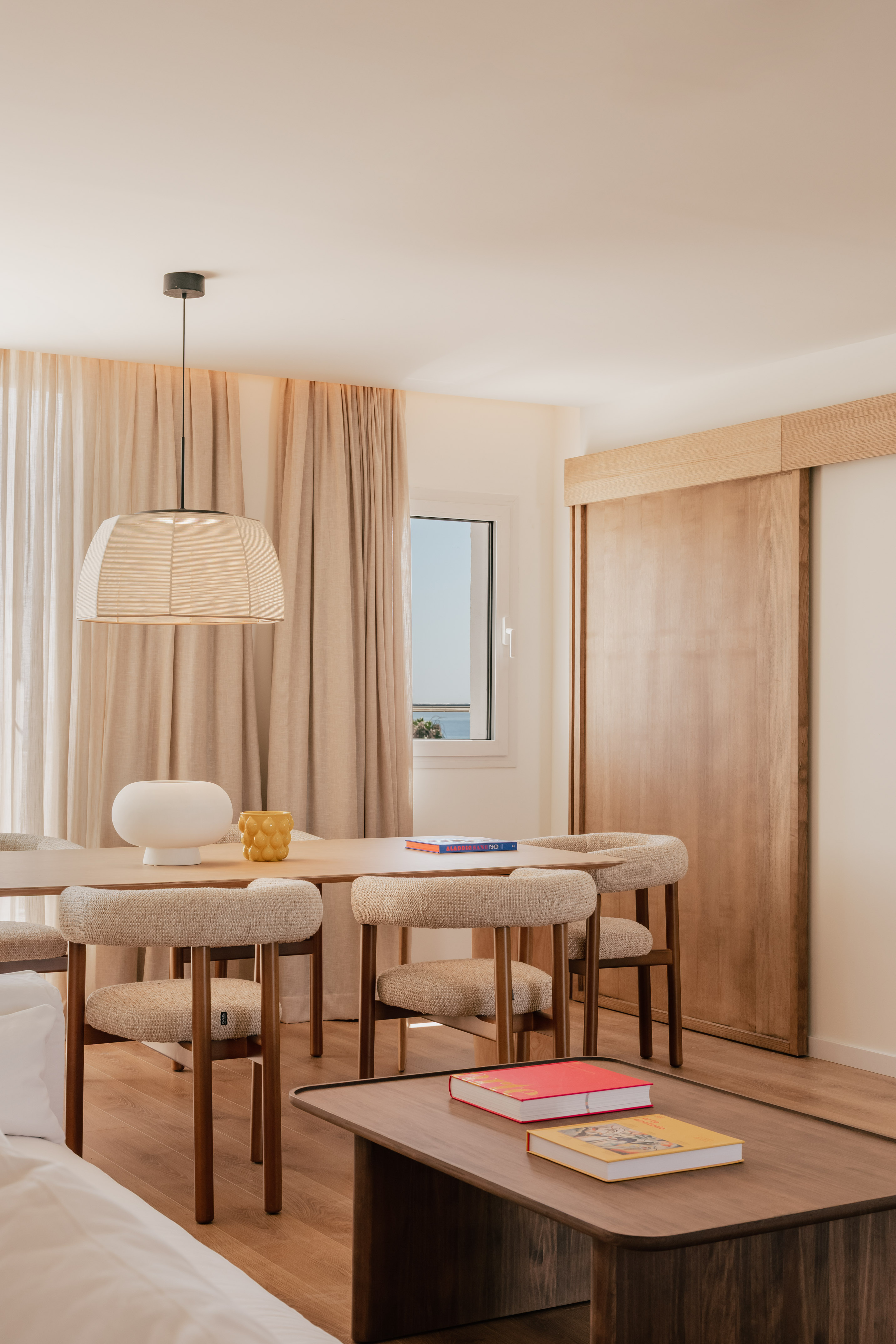 a room with a table and chairs