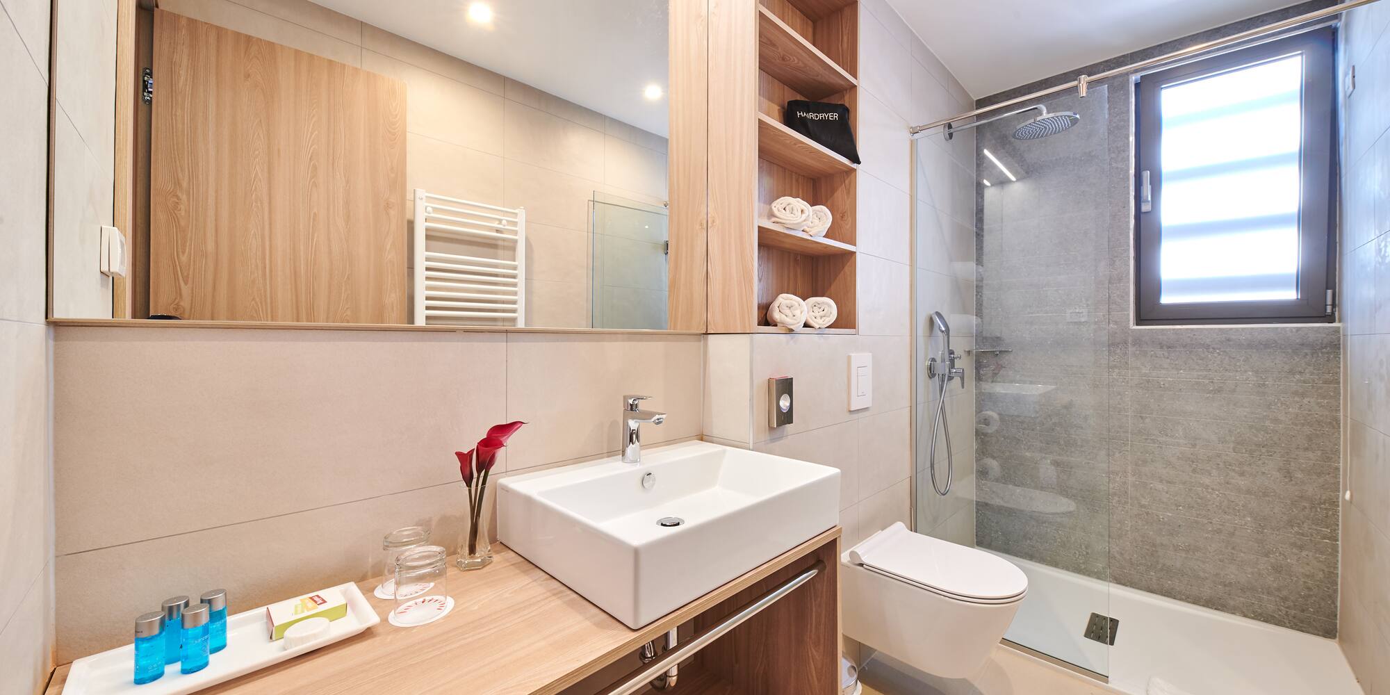 a bathroom with a sink and a shower