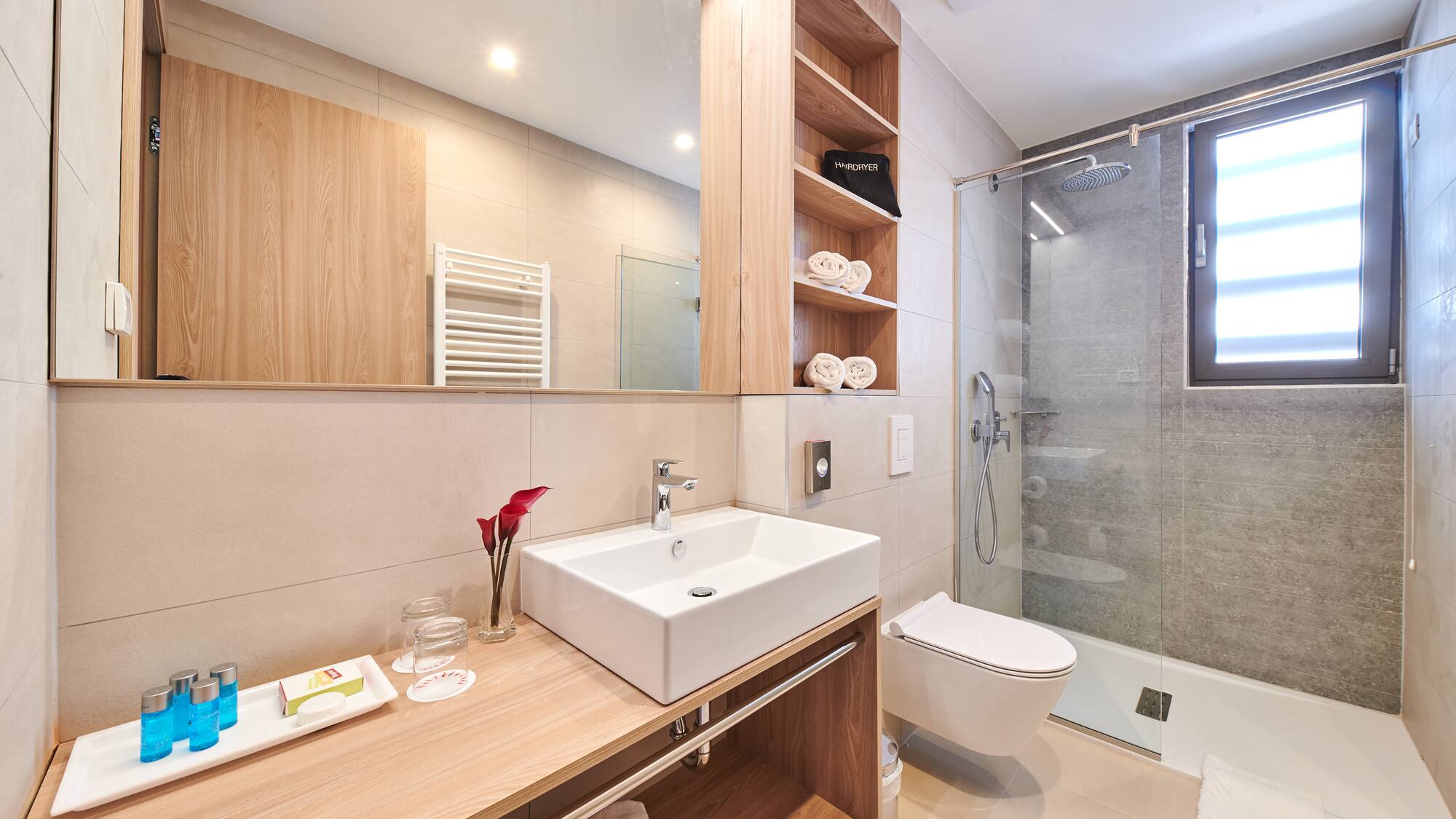 a bathroom with a sink and a shower