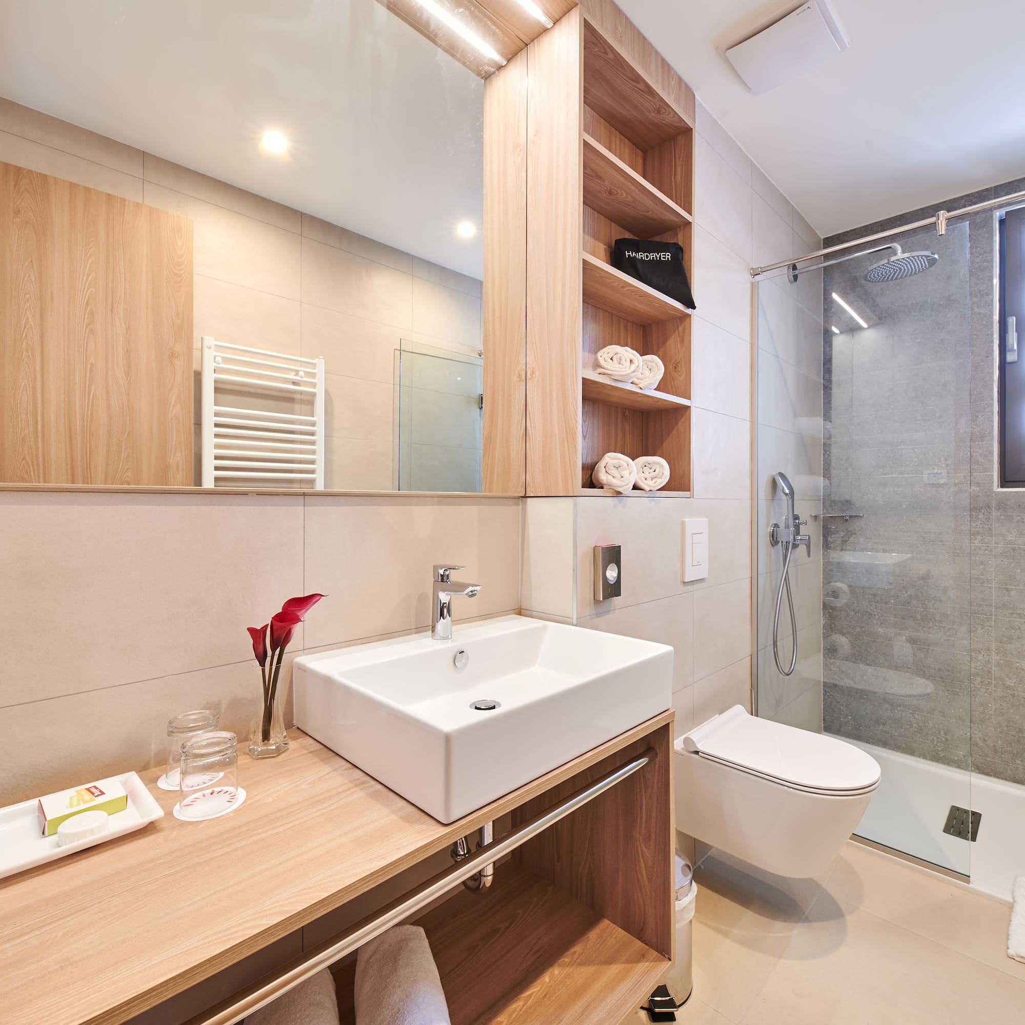 a bathroom with a sink and a shower