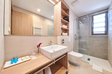 a bathroom with a sink and a shower