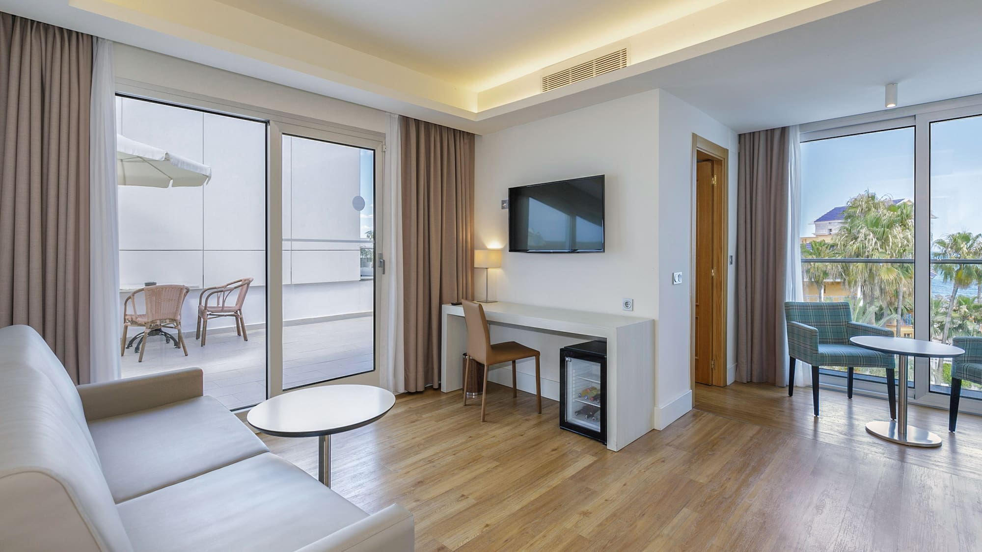 a room with a television and a table