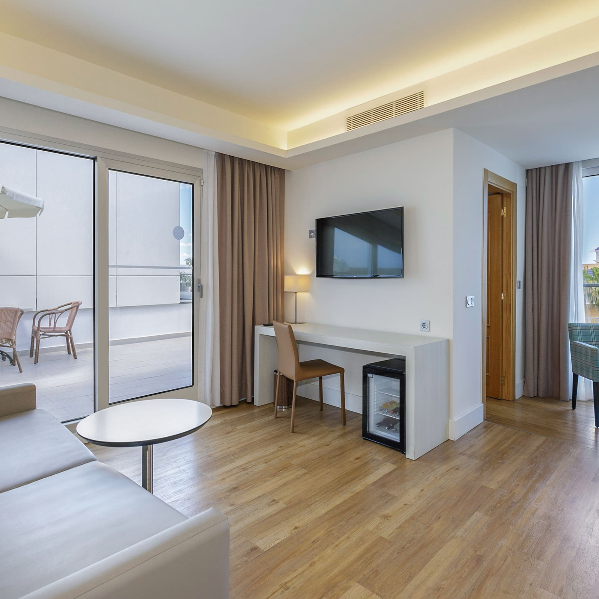 a room with a television and a table