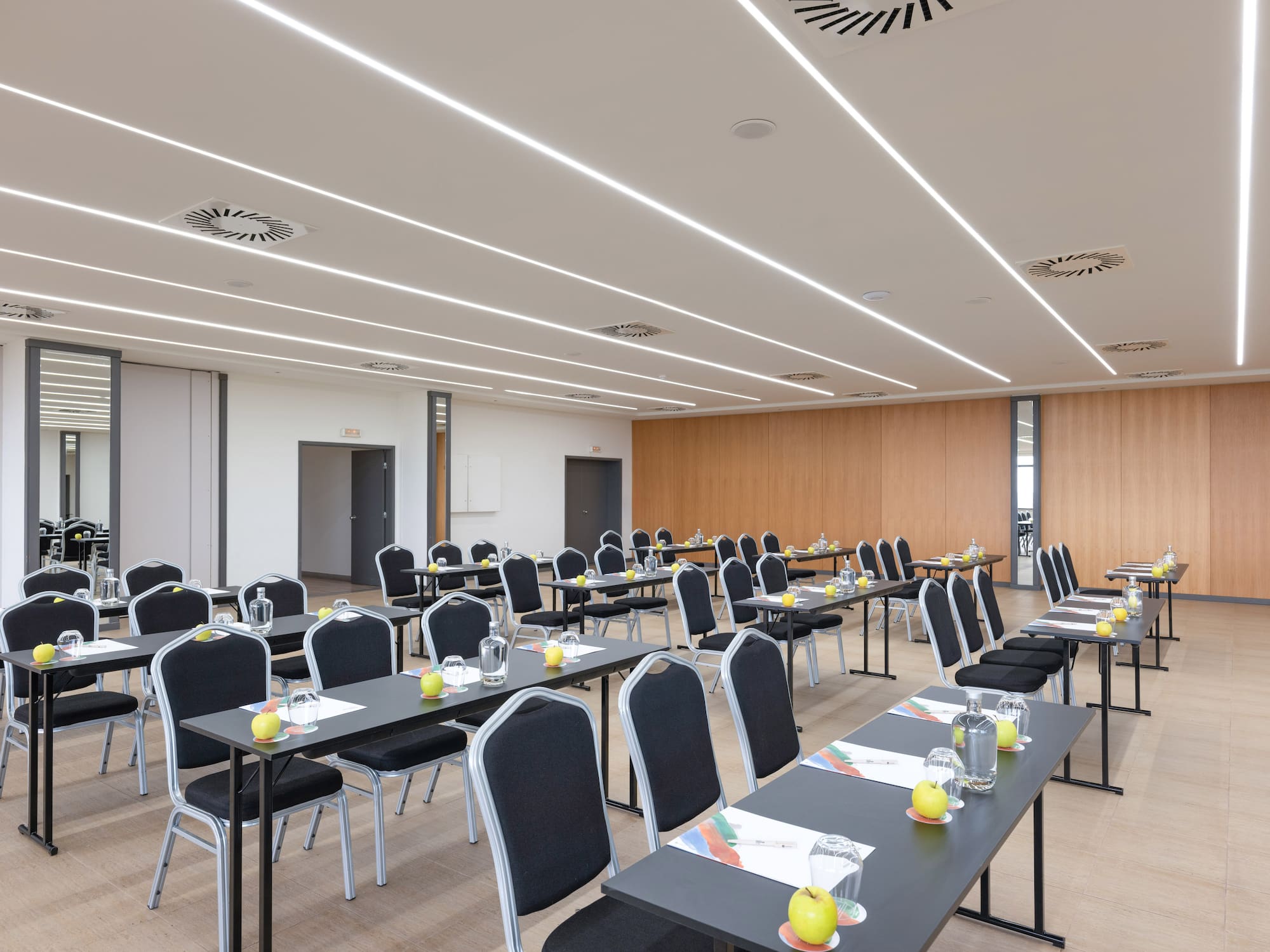 a room with tables and chairs
