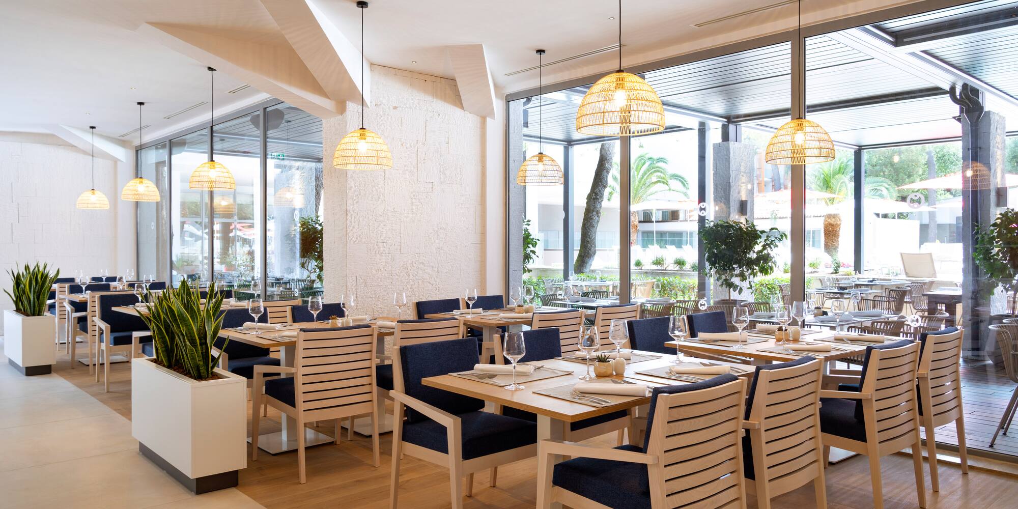 a restaurant with tables and chairs