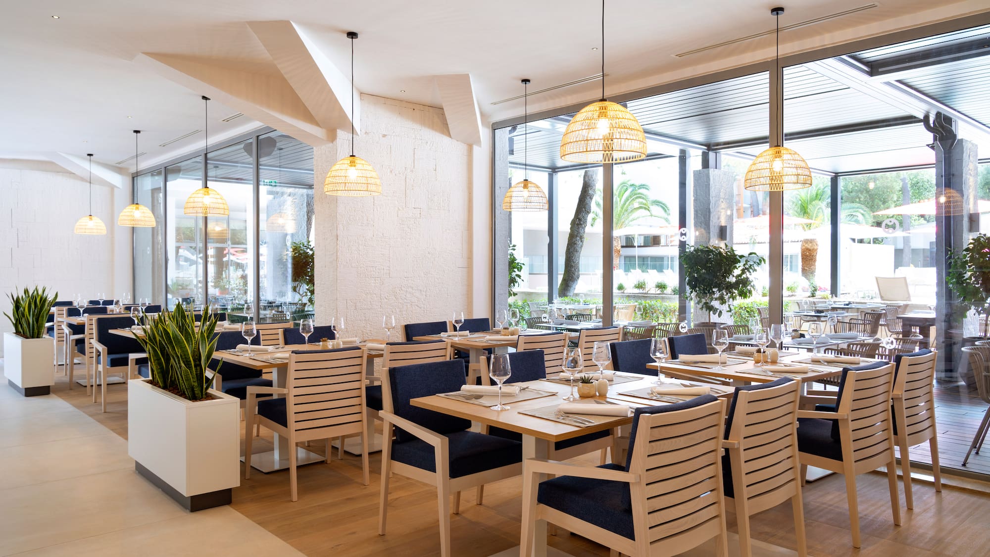 a restaurant with tables and chairs