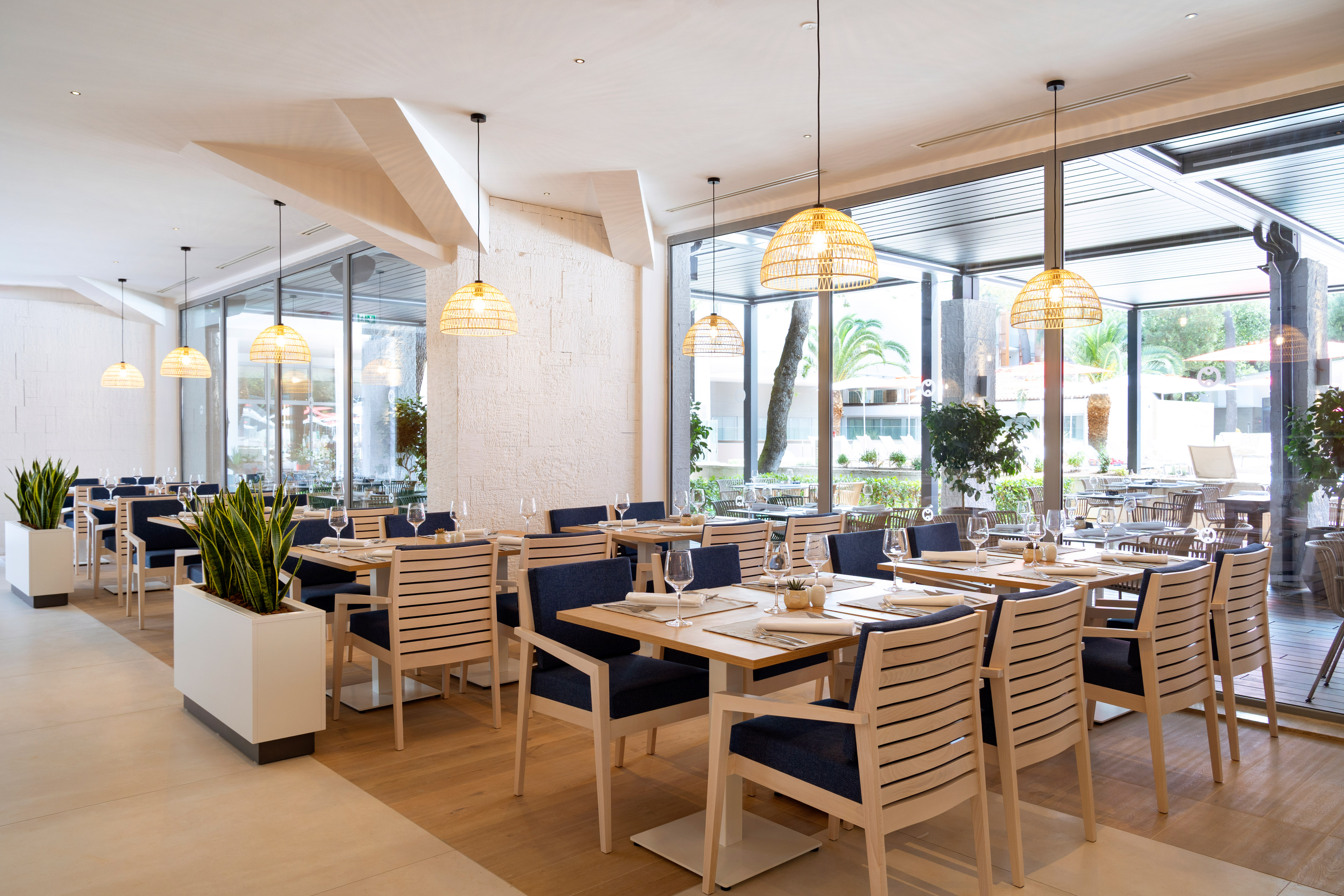 a restaurant with tables and chairs