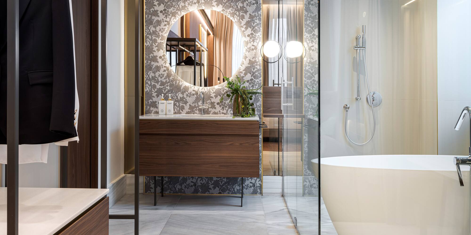 a bathroom with a tub and a shower