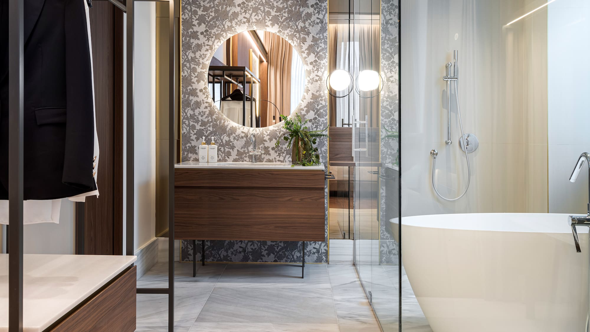 a bathroom with a tub and a shower