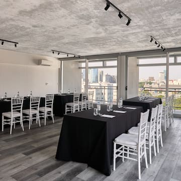 a room with tables and chairs