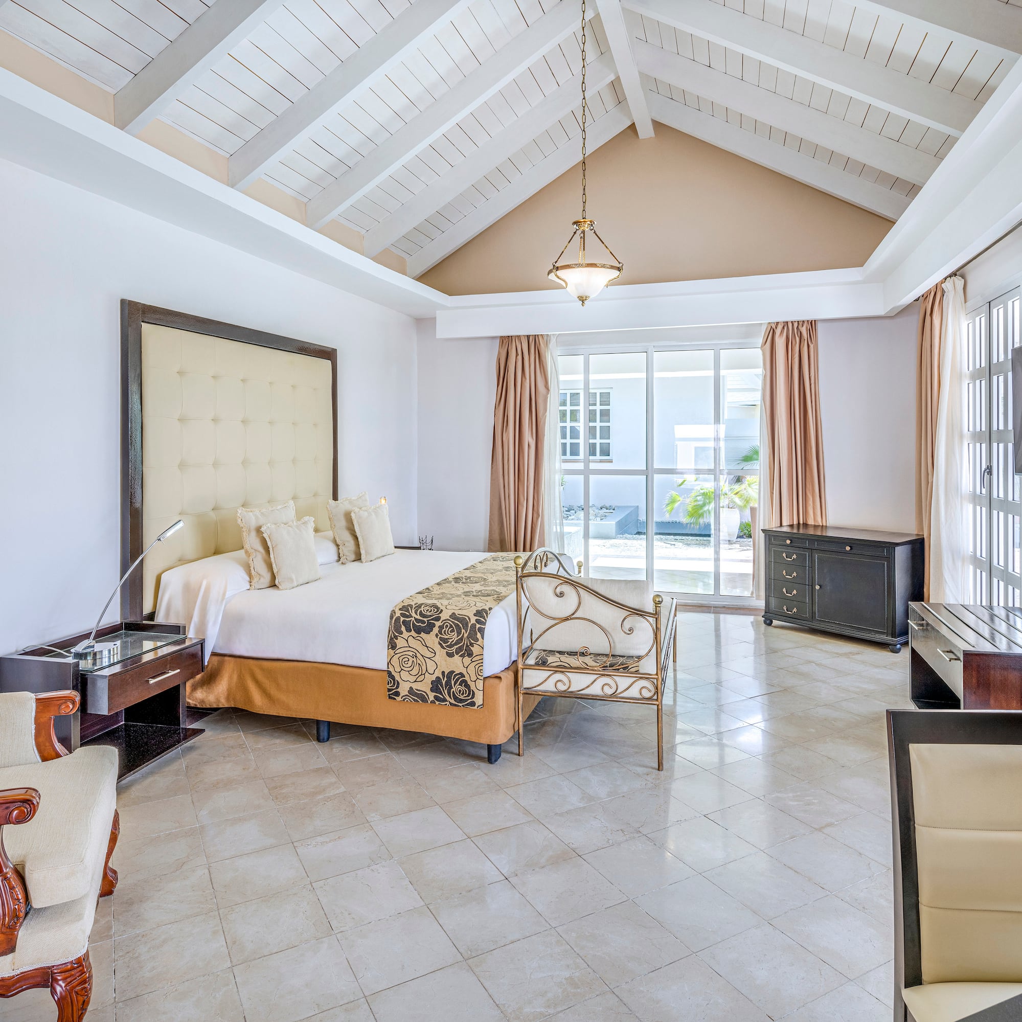 a bedroom with a bed and a piano