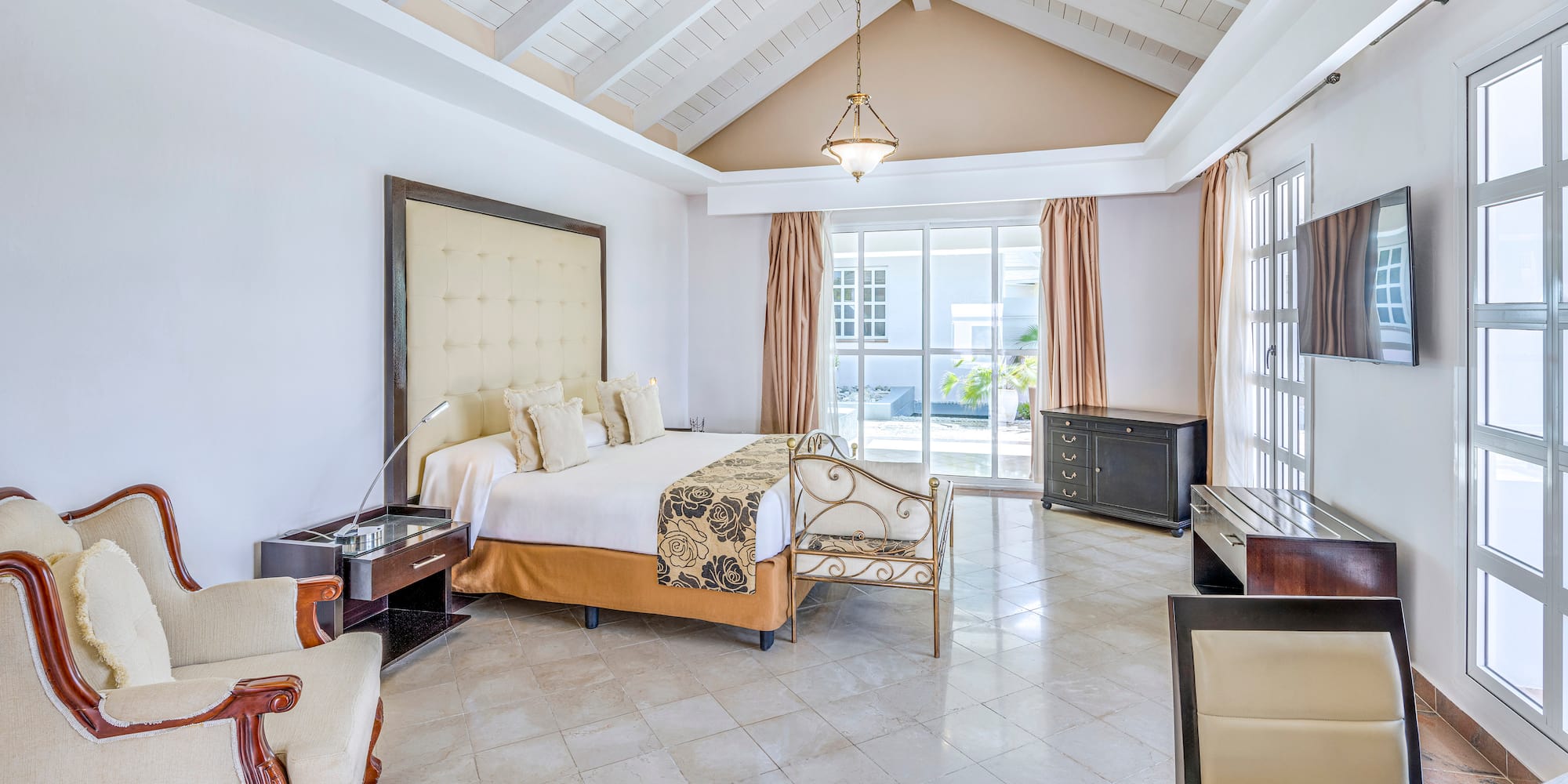 a bedroom with a bed and a piano