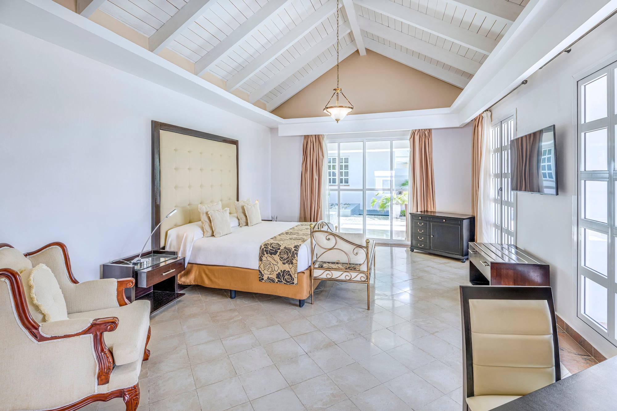 a bedroom with a bed and a piano