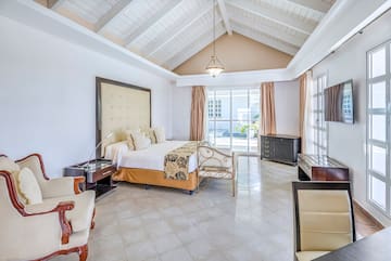 a bedroom with a bed and a piano