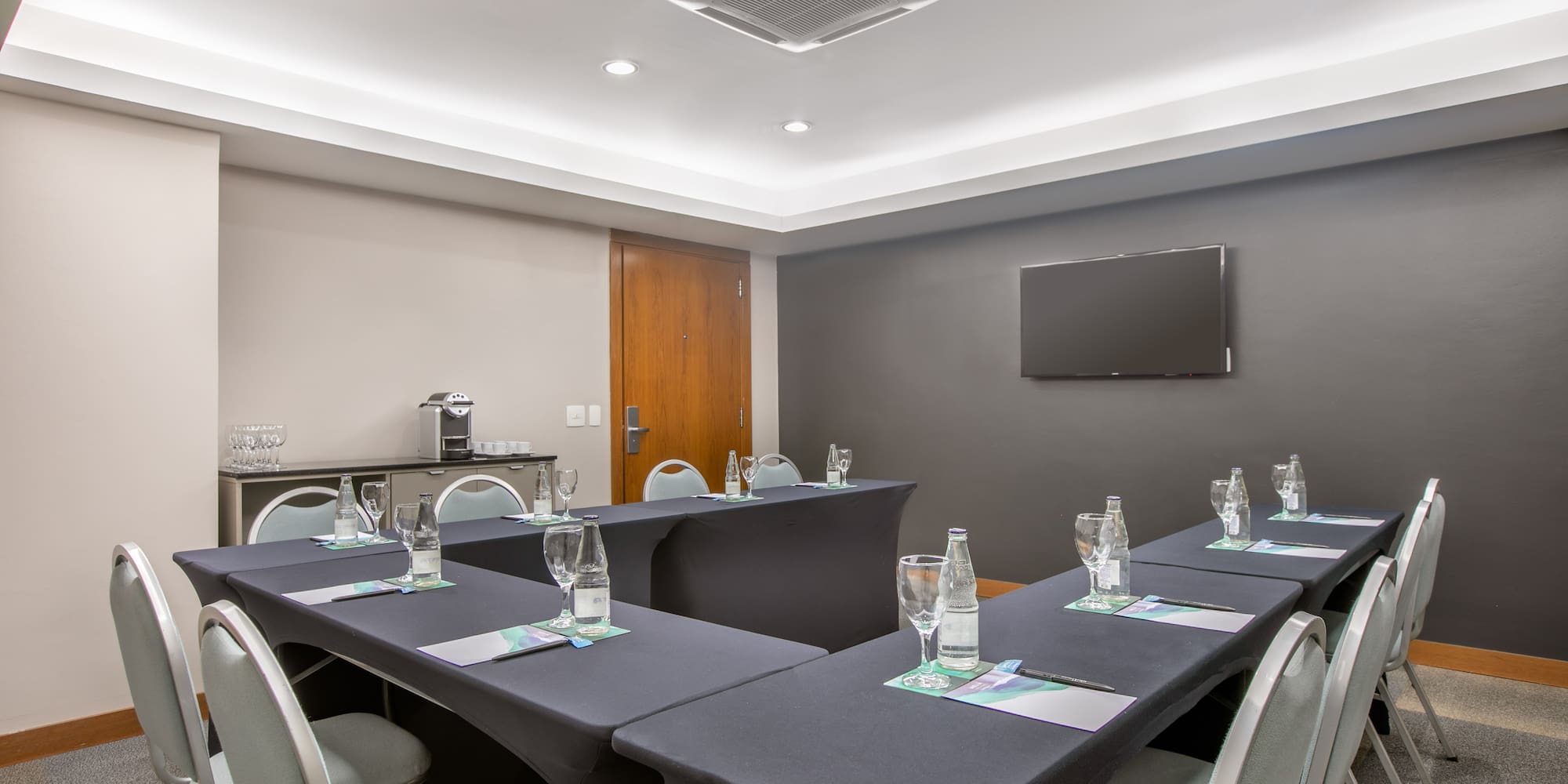 a room with tables and chairs