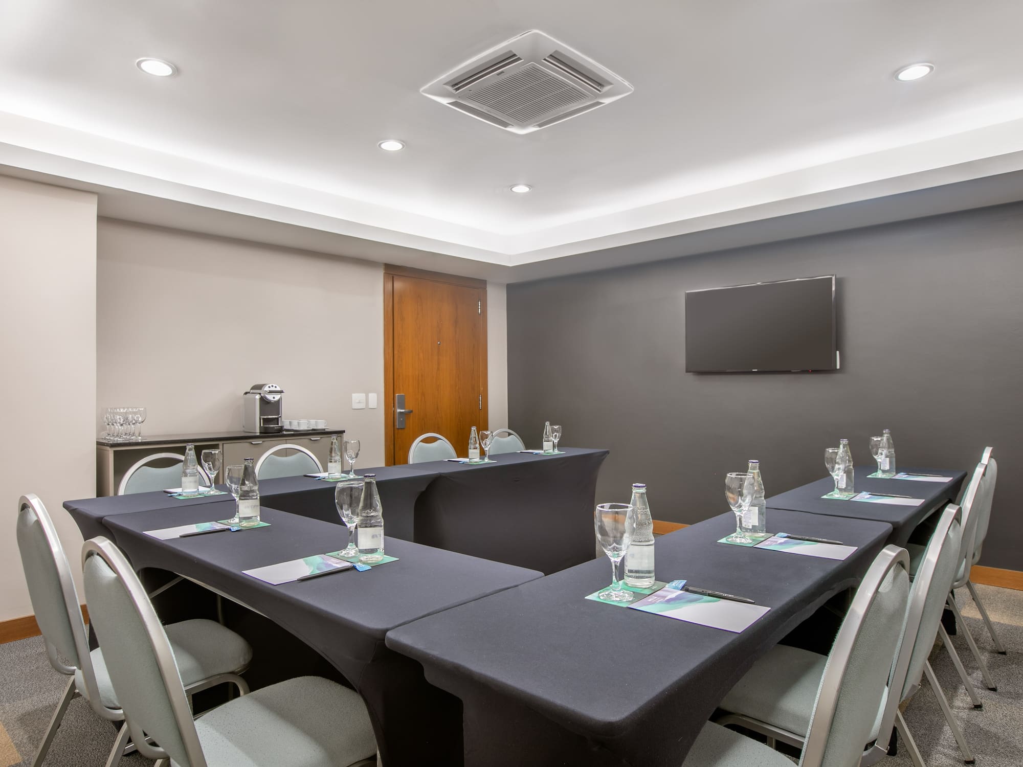 a room with tables and chairs