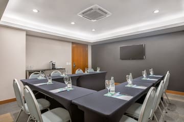 a room with tables and chairs