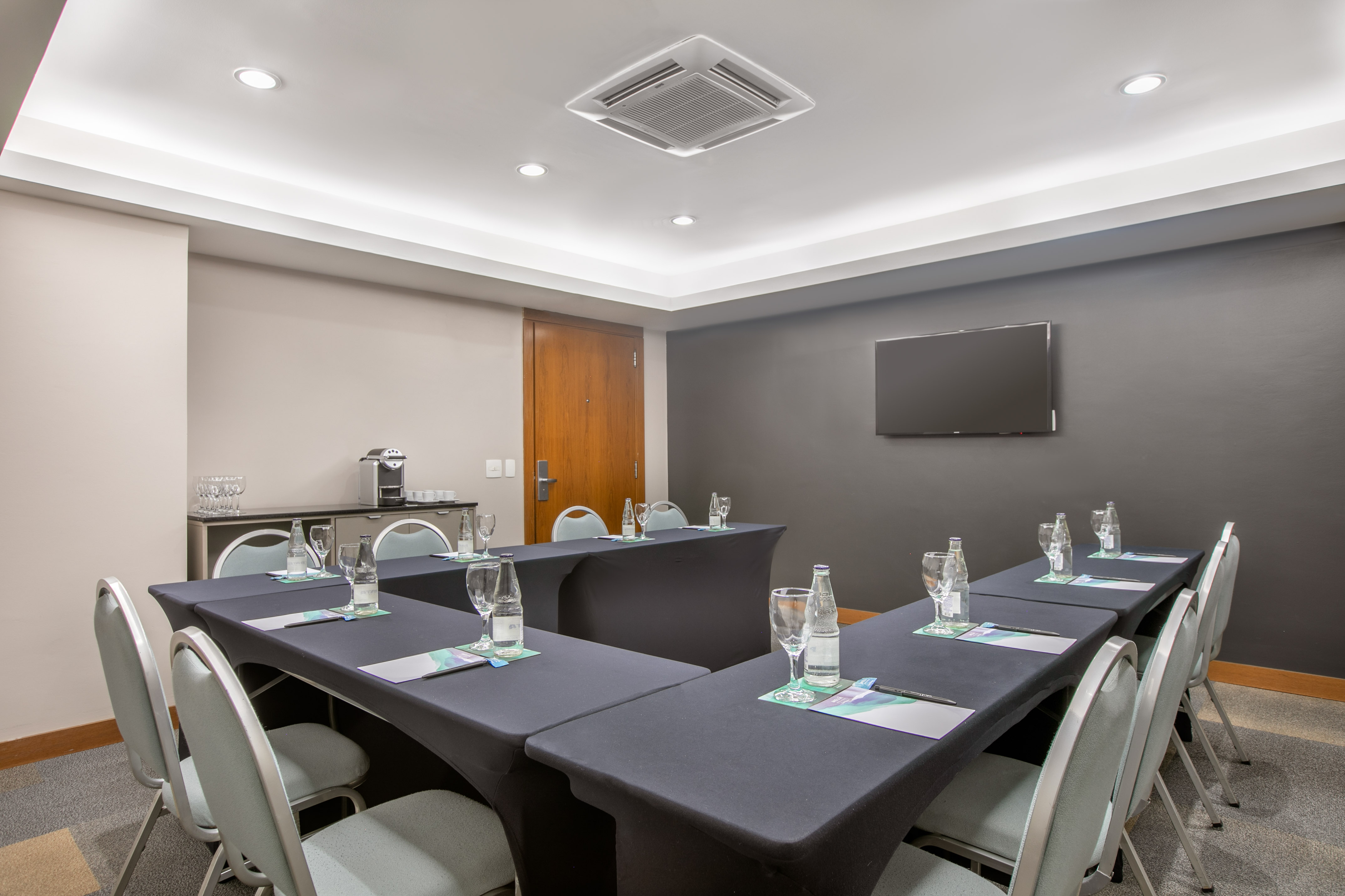 a room with tables and chairs