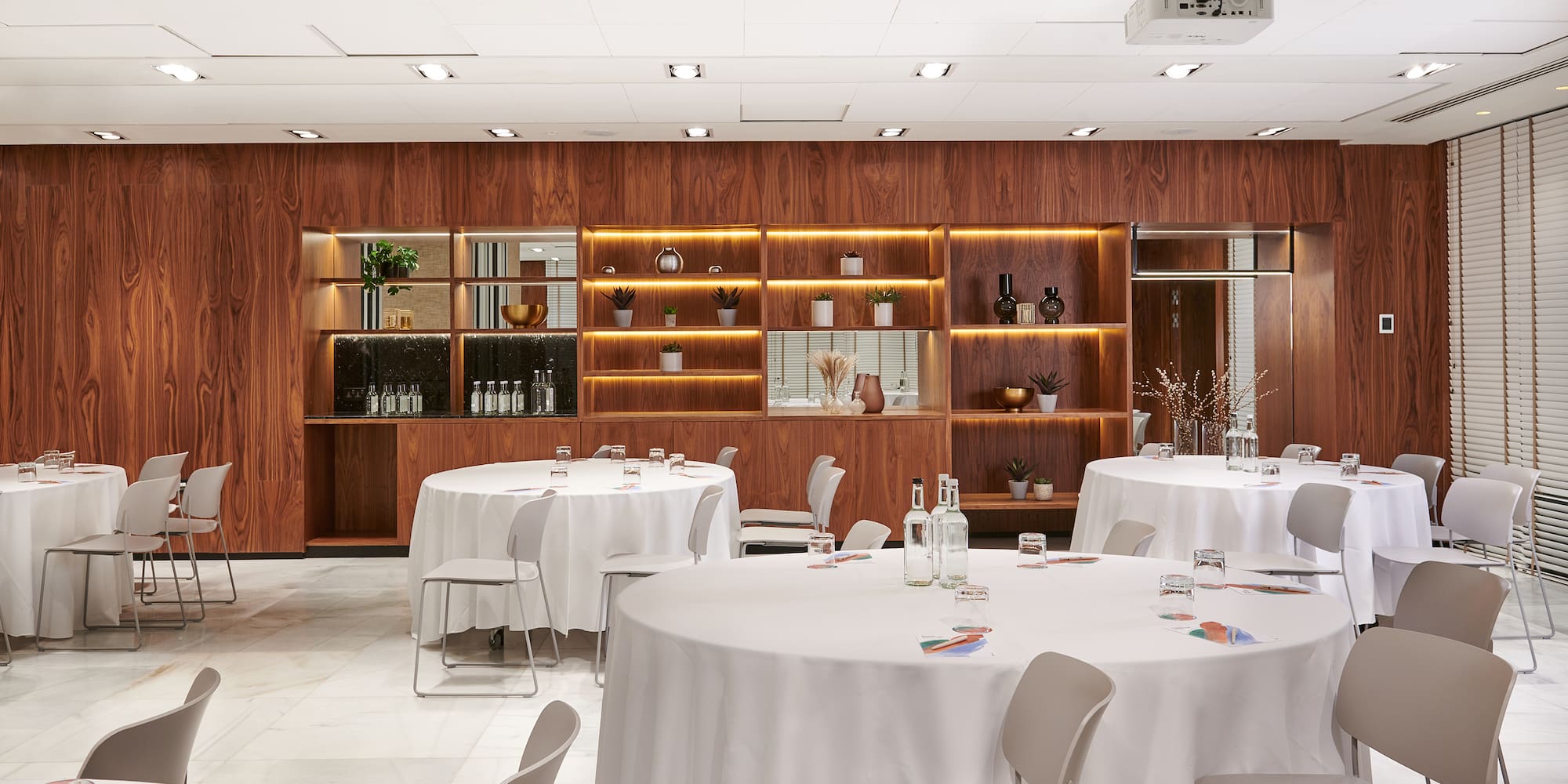 a room with tables and chairs