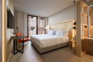 a room with a bed and a table