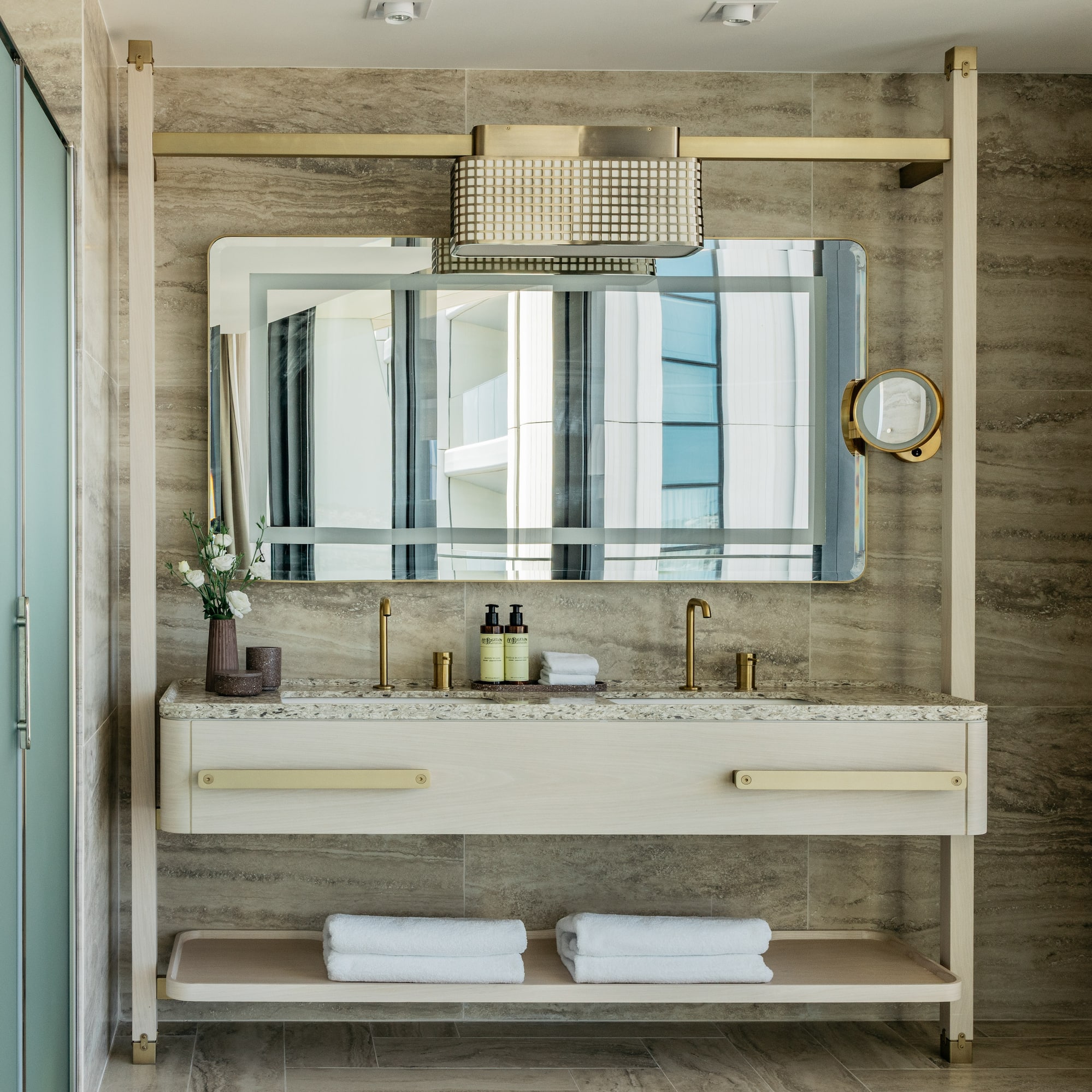 a bathroom with a mirror and sink