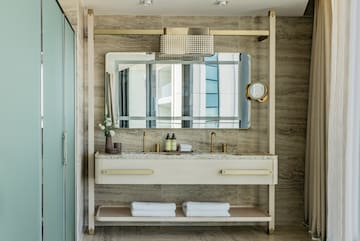 a bathroom with a mirror and sink